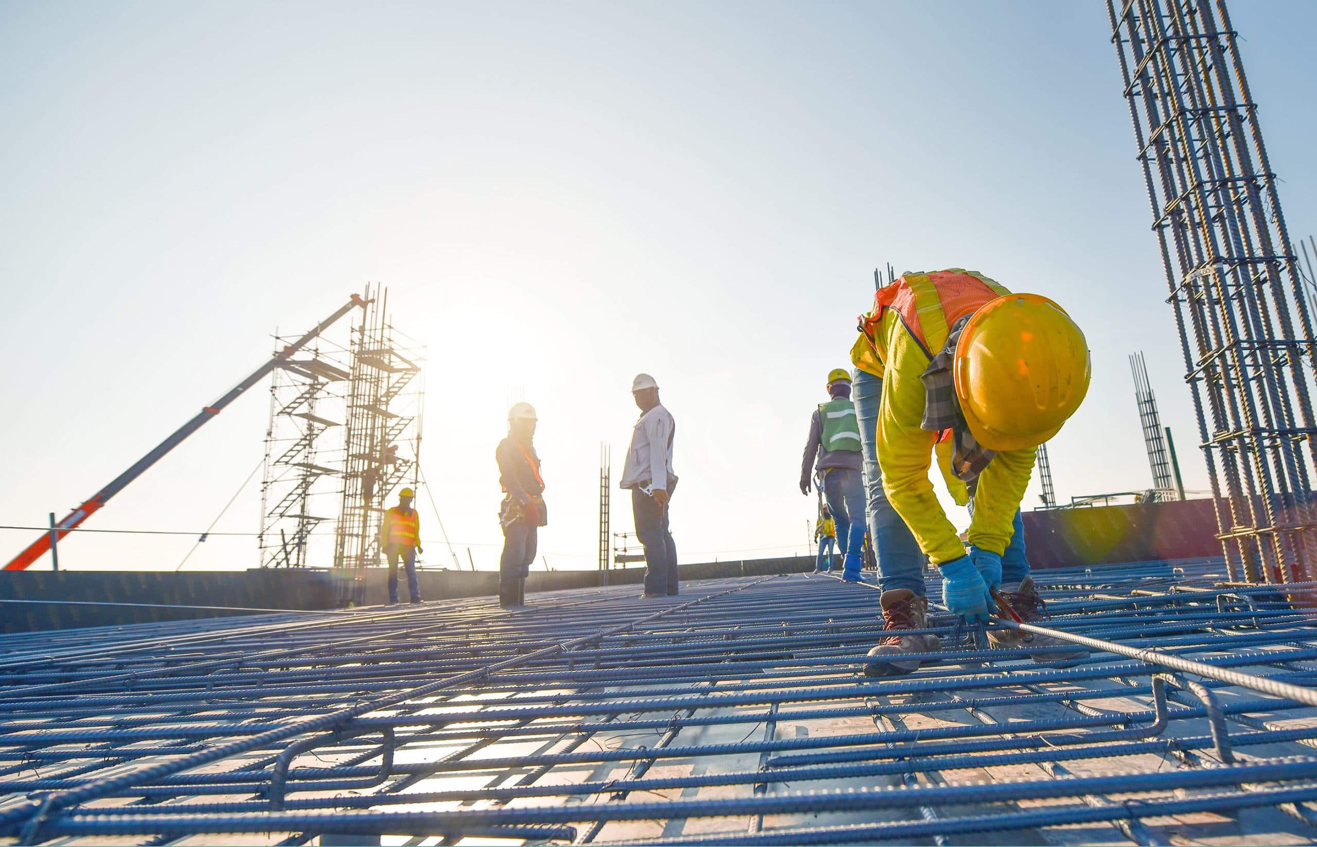 This is an image of construction workers being exposed to potential causes of lung cancer.