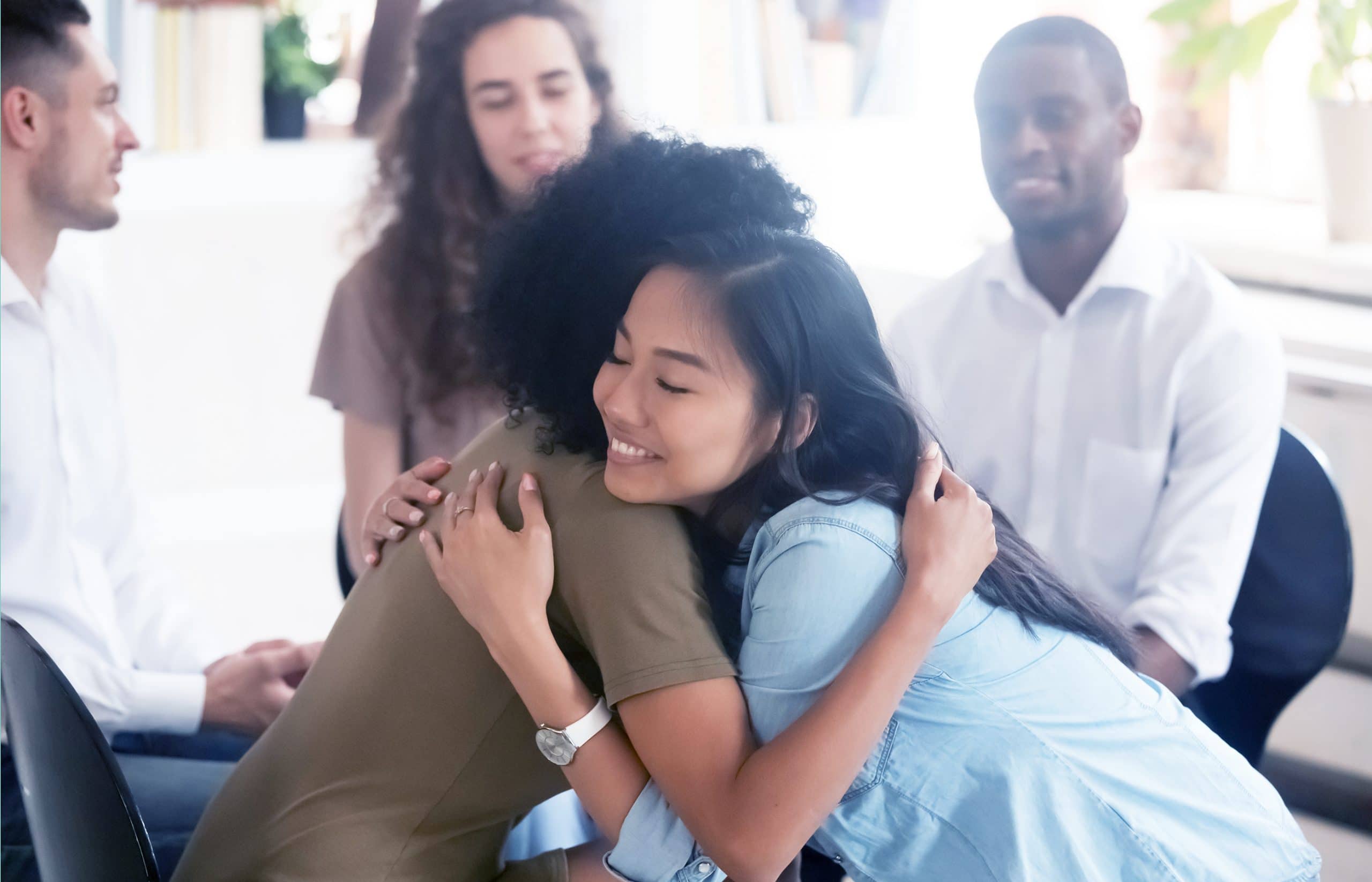 This is an image of caregivers supporting each other in support groups.