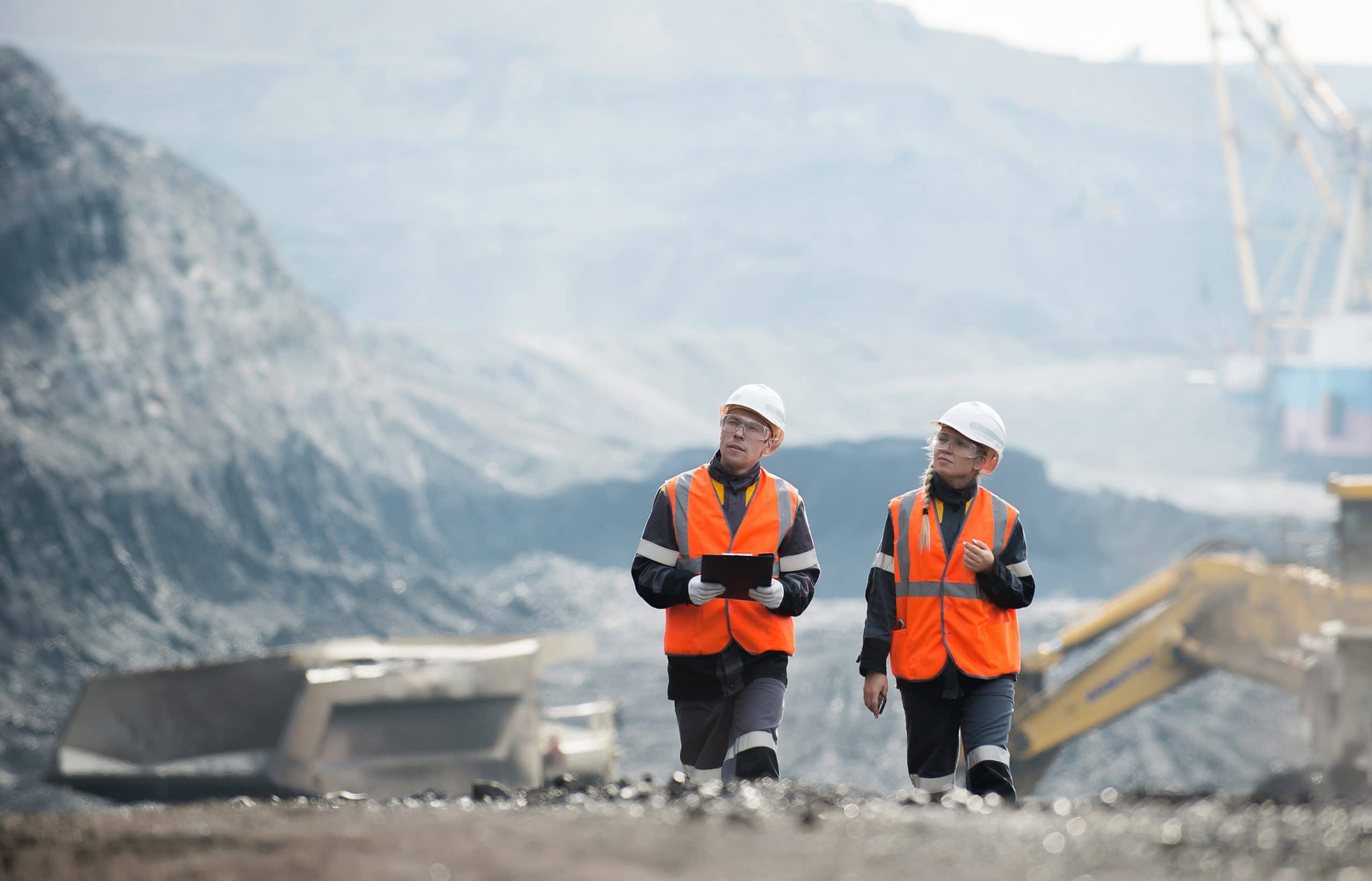 This is an image of two miners on the job, potentially being exposed to asbestos.