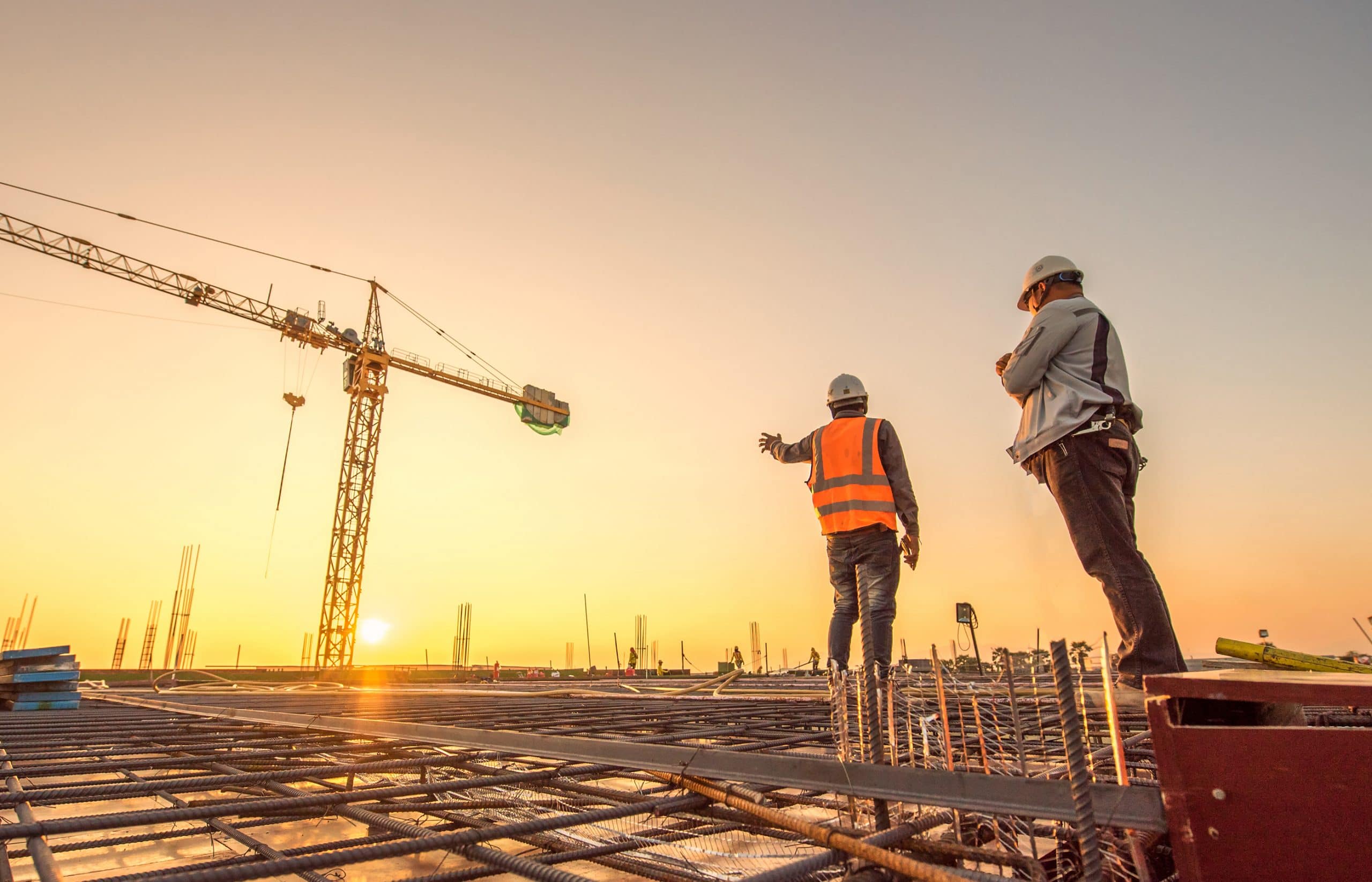 This is an image of a construction site - where the workers are potentially exposed to asbestos.