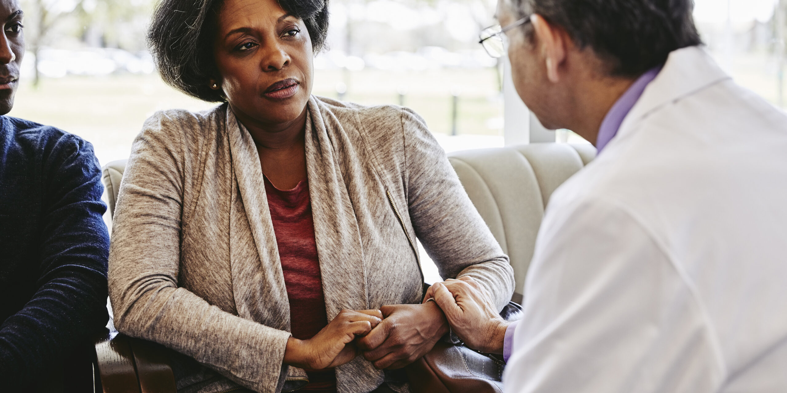 doctor speaking with patient